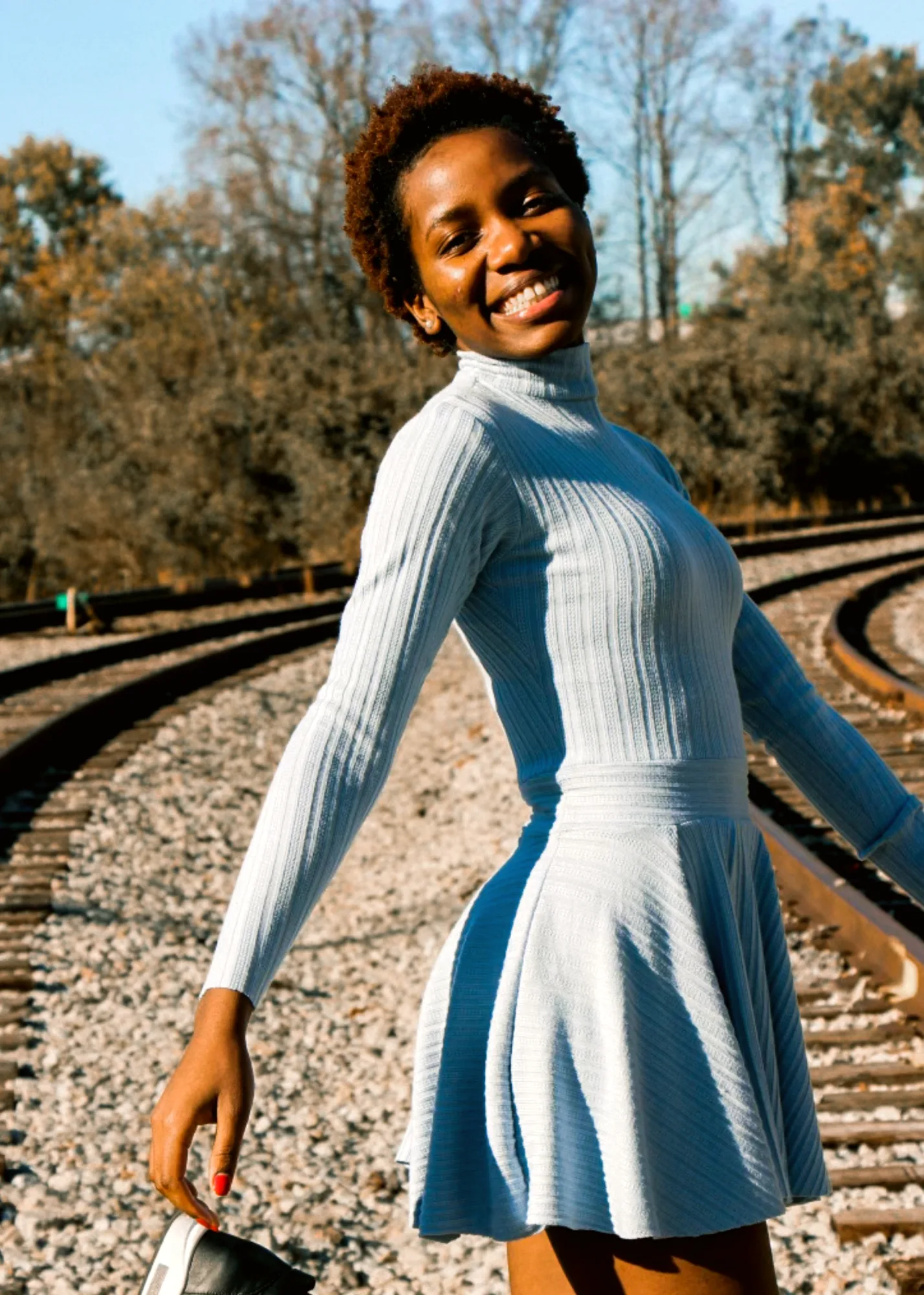 A pale blue ribbed knit dress, front view